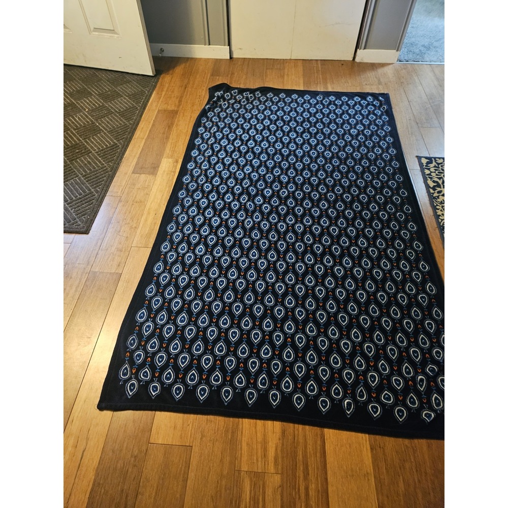 Vera Bradley Plush Throw Blanket features a Distinct Marrakesh Motifs Pattern.